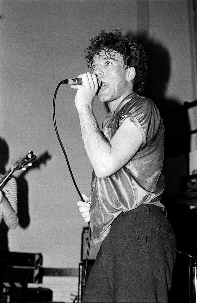 Young Michael Stipe performing onstage
