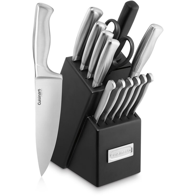 Metal knives in a black knife block