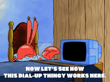 Mr. Krabs from the TV show &quot;SpongeBob SquarePants&quot; trying to figure out a dial-up computer