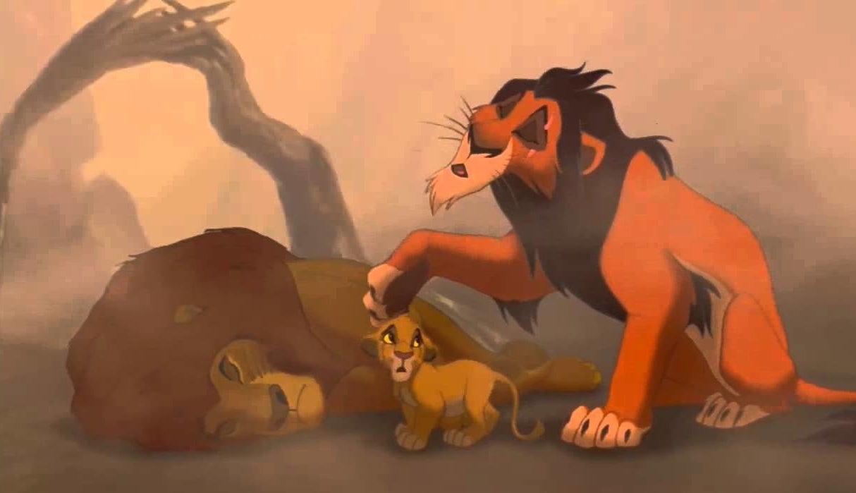 Scar pretending to comfort Simba as they stand next to Mufasa&#x27;s body