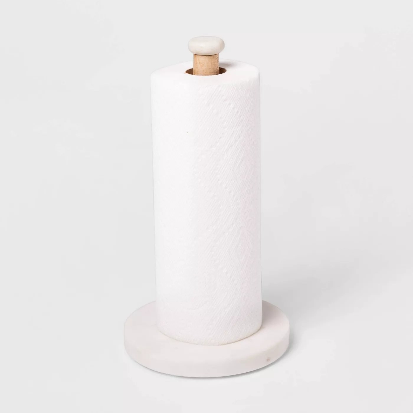 The holder holding a roll of paper towel