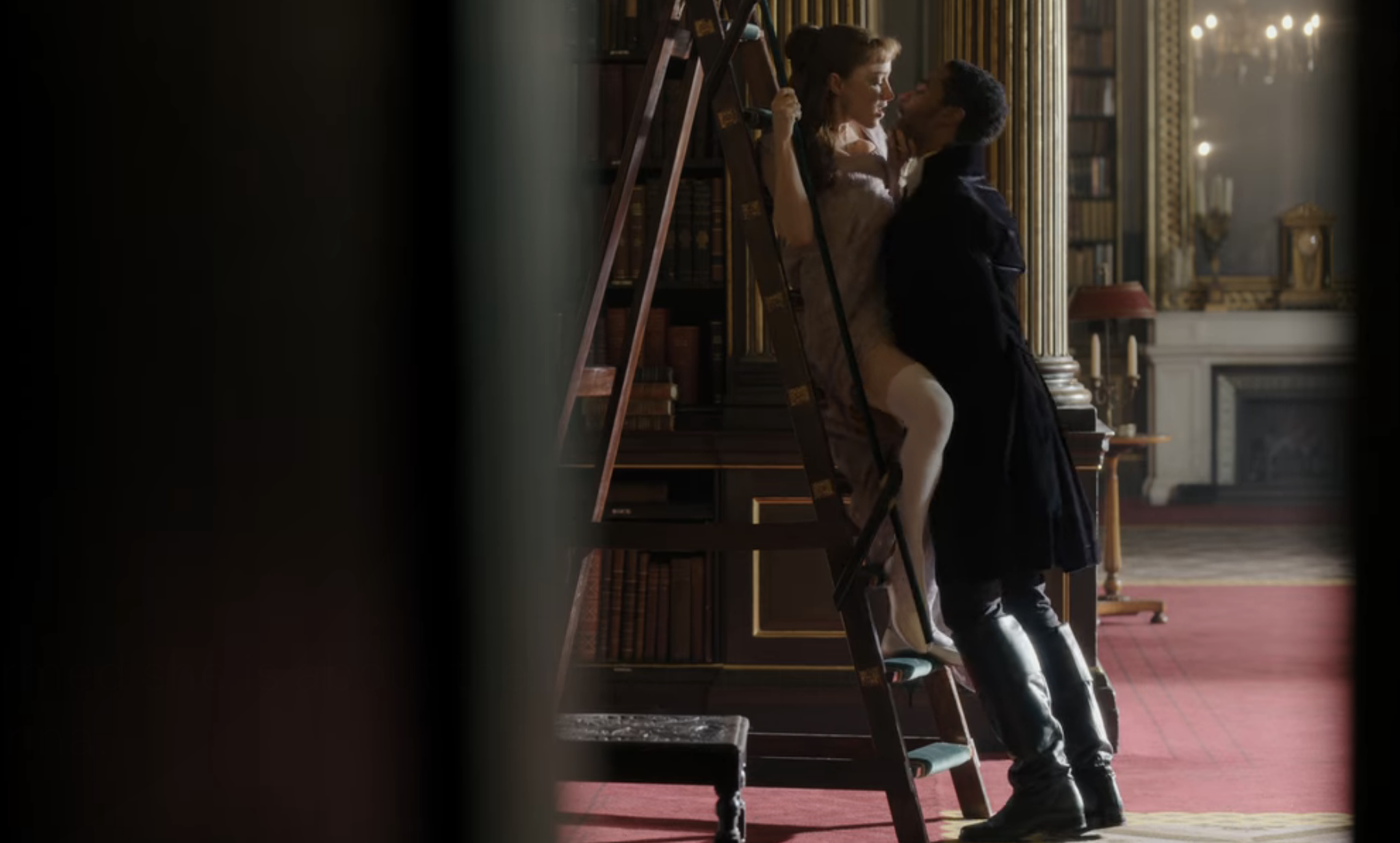 Simon and Daphne having sex on a ladder in a library in &quot;Bridgerton&quot; episode 6