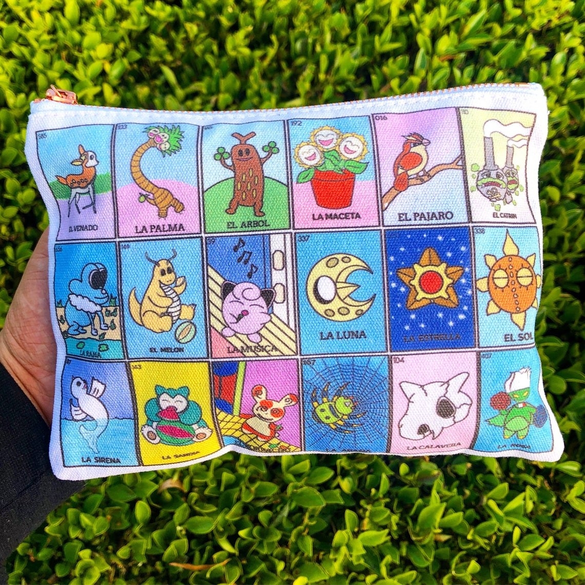zipper pouch with pattern of loteria cards with pokemon on them