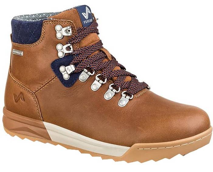 a tan sneaker boot with blue accents and lace