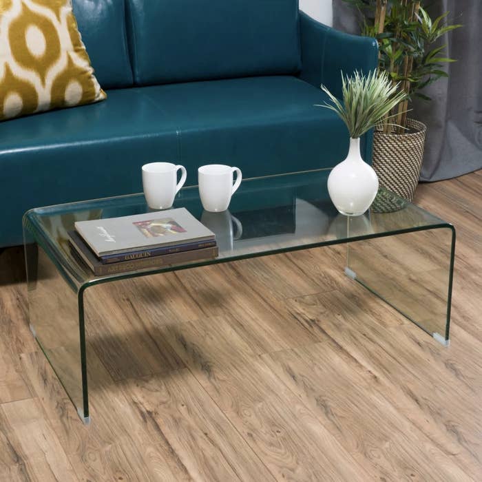 A clear glass coffee table