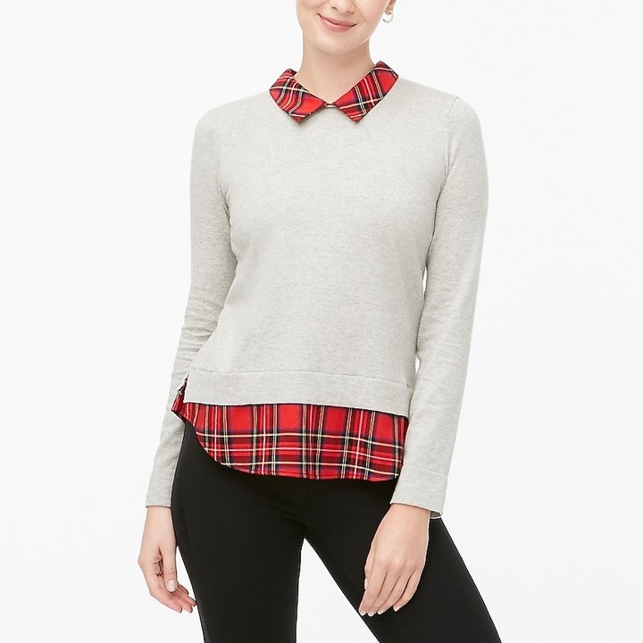 model wearing the grey sweater with plaid collar
