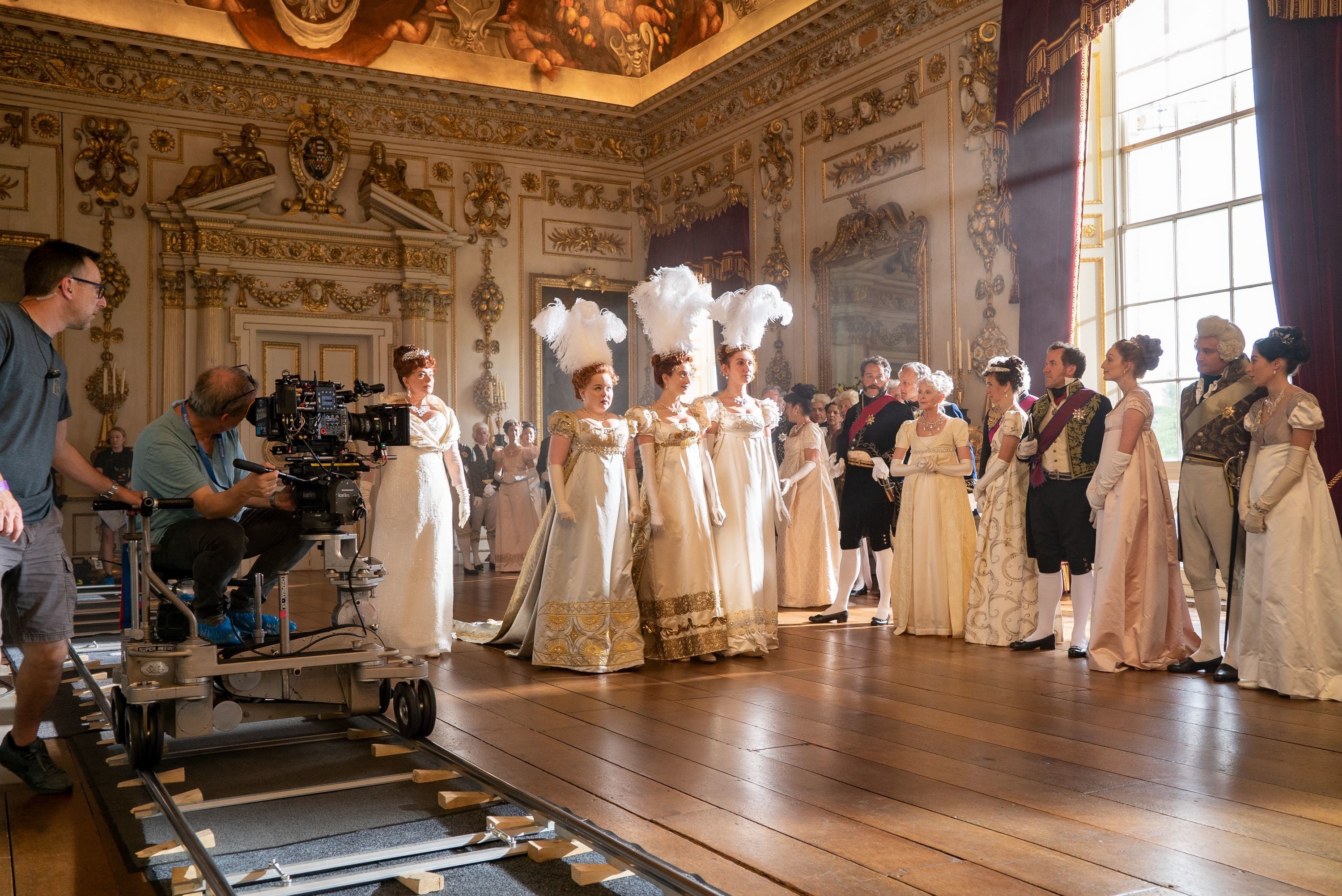 The Featherington sisters filming their entrance in Episode 1