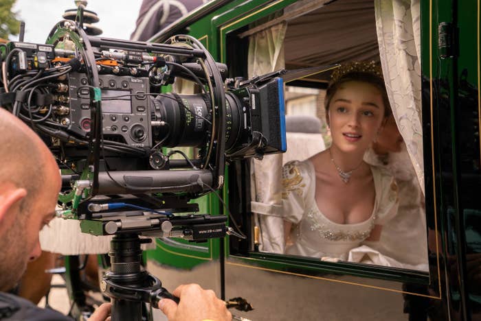 Phoebe Dynevor as Daphne Bridgerton filming a scene