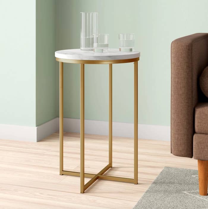 The end table in white and brass