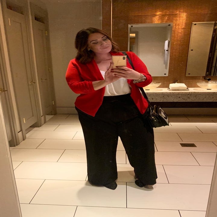 Reviewer wearing the 3/4-sleeve open blazer in red