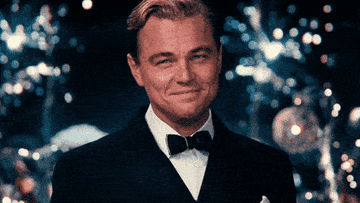 Leonardo DiCaprio as Gatsby, offering up a cheers