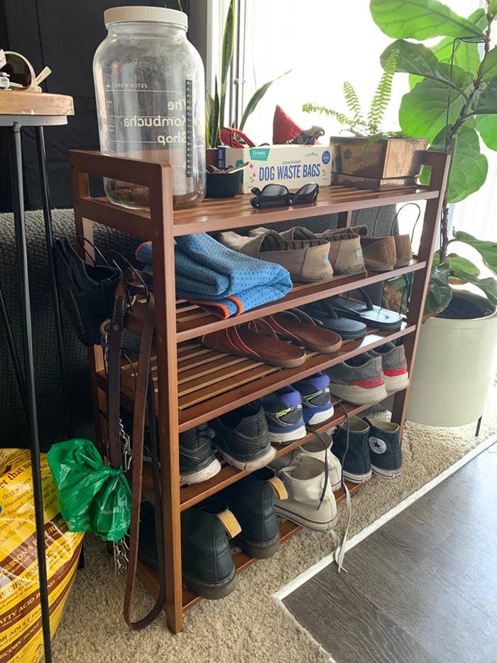 the Homfa Bamboo Shoe Rack in a customer&#x27;s home storing sneakers