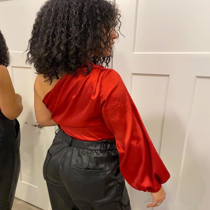 Reviewer wearing red blouse