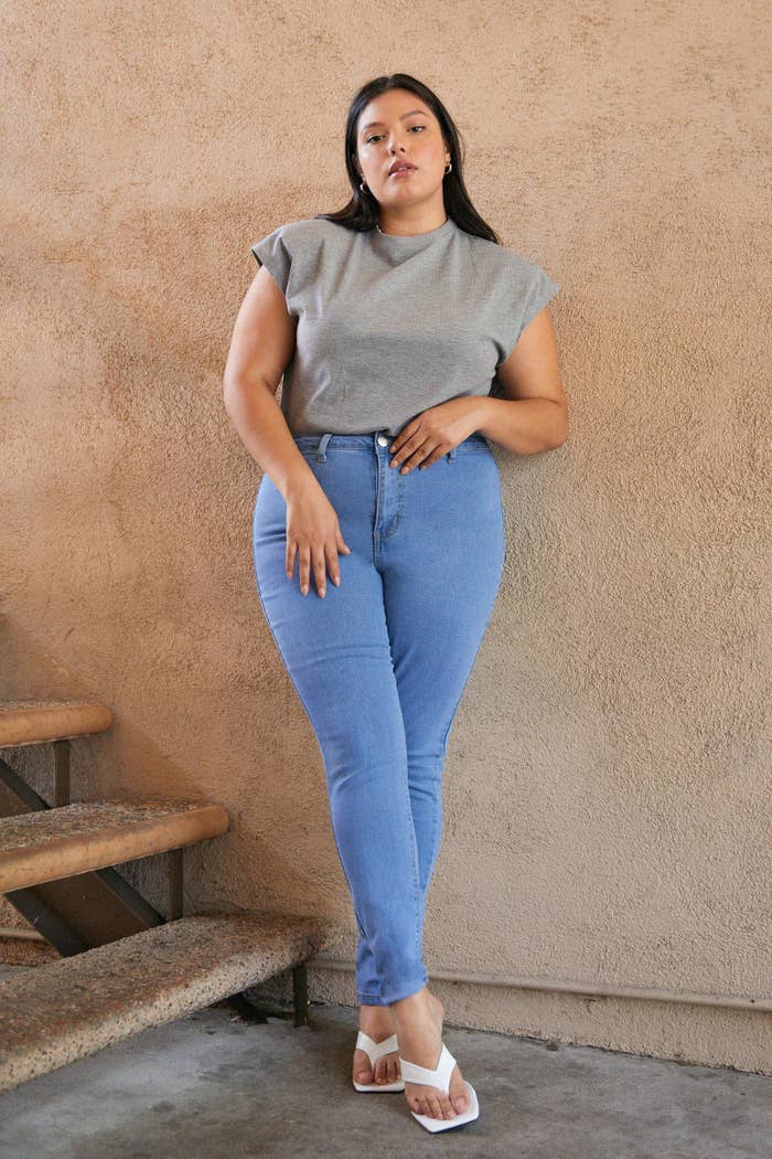 Model wearing blue jeans