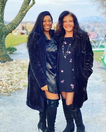 Reviewers wearing black long-lined coat