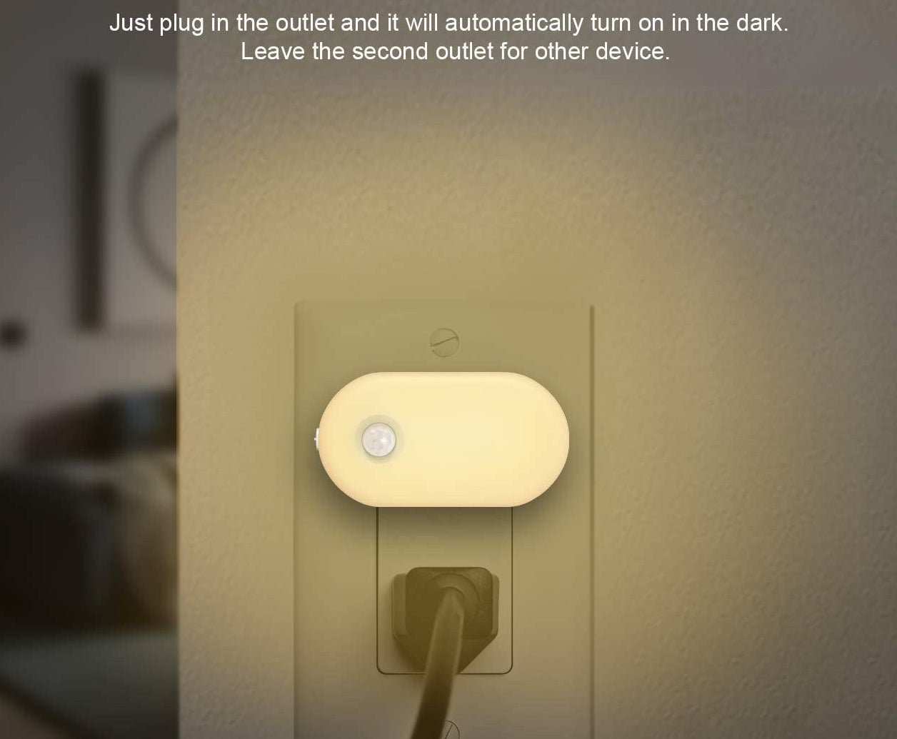 The motion sensor night light plugged into an AC outlet