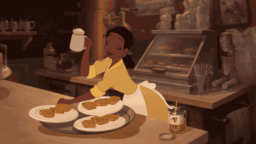 Tiana making beignets