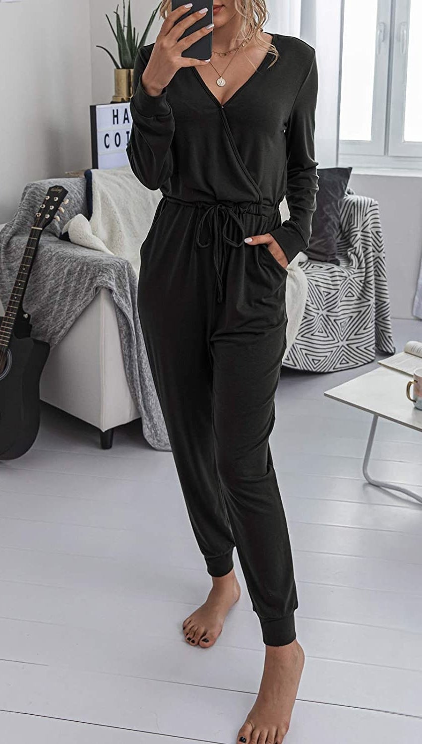 Model wearing black jumpsuit