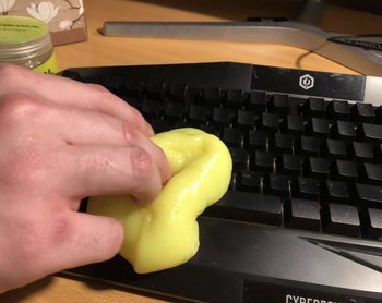 A different reviewer using the cleaning gel on their computer keyboard