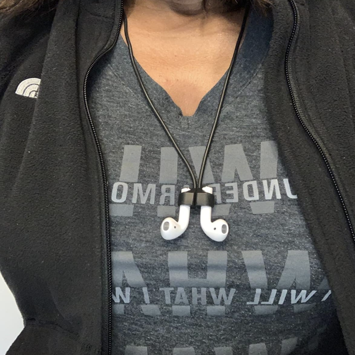 Amazon customer wearing AirPods strap with magnets attached