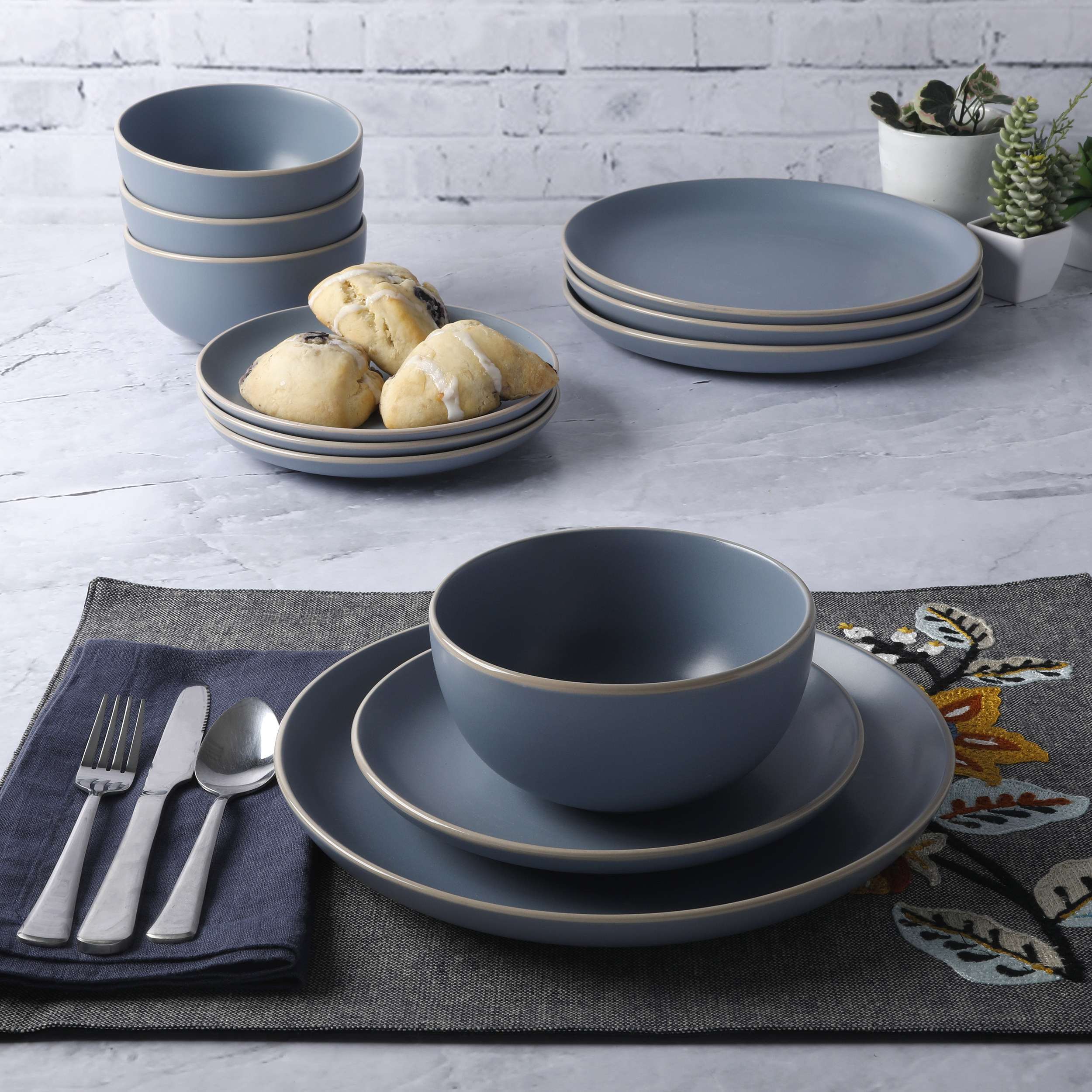 The dinnerware set in the color Blue