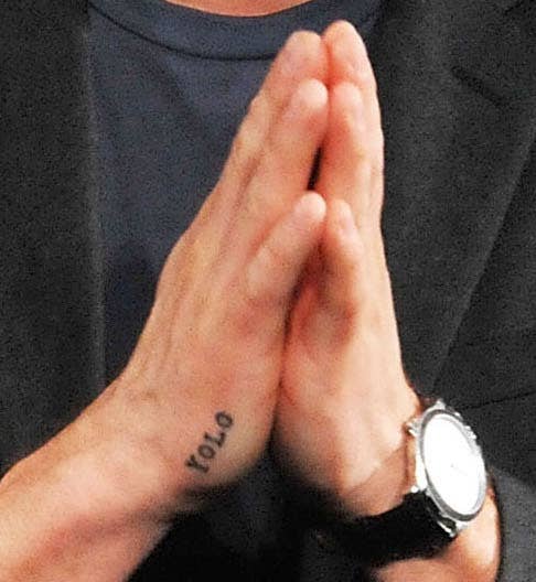 A closeup of the hand tat