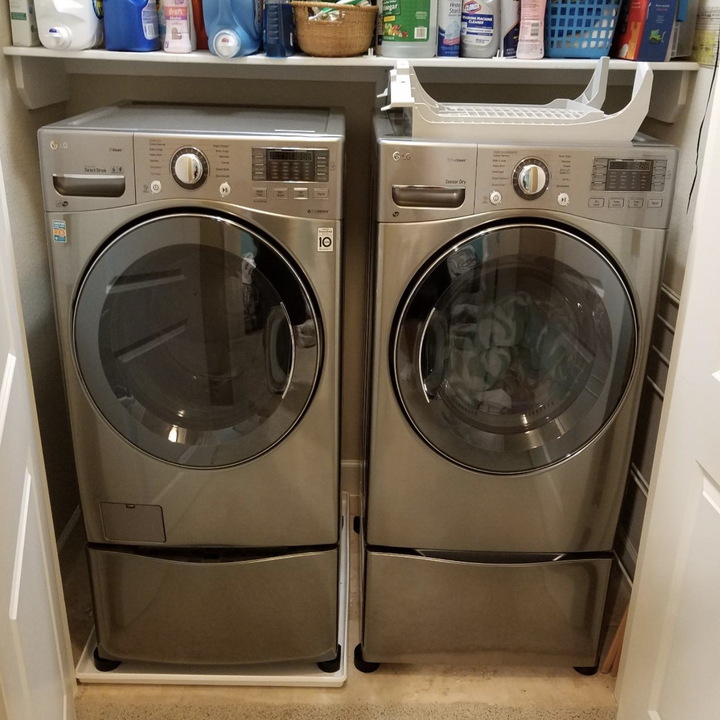 reviewer image of their washer with pads attached to bottom