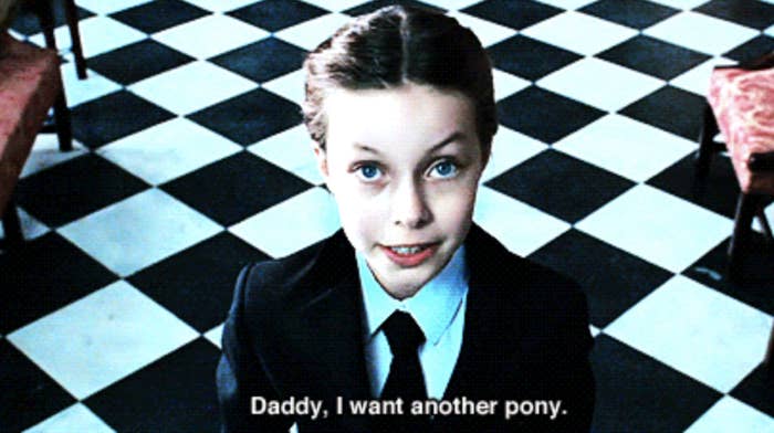 Young boy saying, "Daddy, I want another pony."