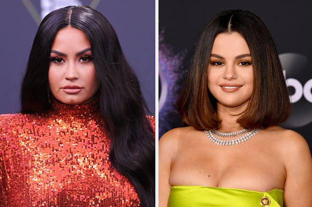 Demi Lovato is on the left in a sequins dress with Selena Gomez in a halter dress