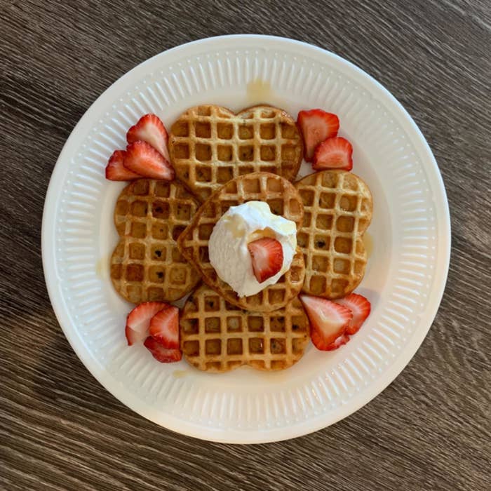 mini heart shaped waffles with strawberries on a plate