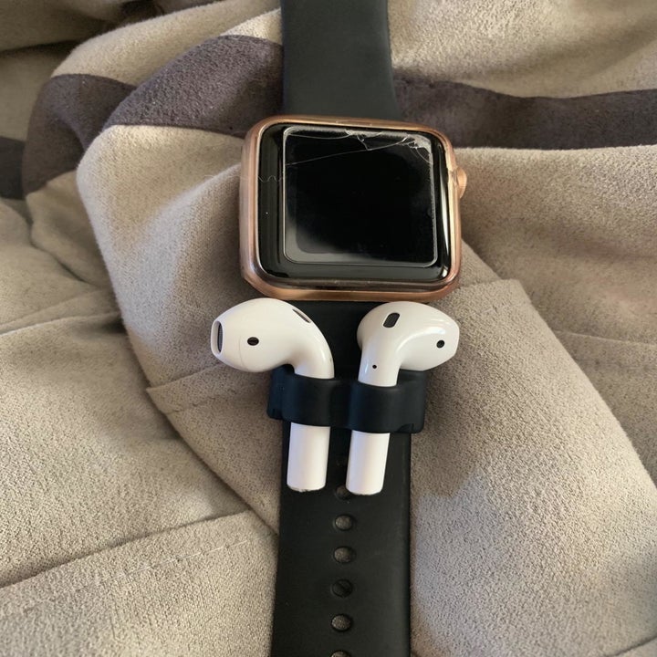 Amazon reviewer photo of AirPods in Apple Watch accessory 