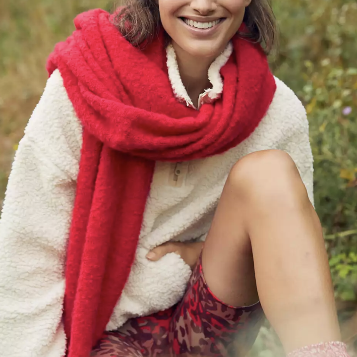 model wearing the red scarf
