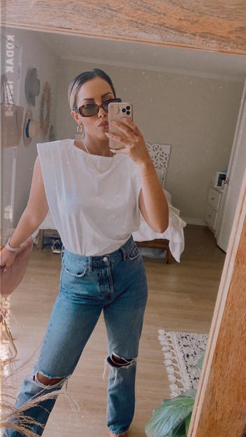 a different reviewer wearing the tee in white