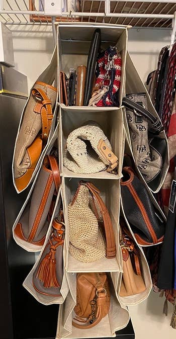 another review photo showing bag organizer in closet holding larger tote style bags