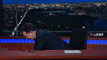 Stephen Colbert randomly mashing his hand into a calculator