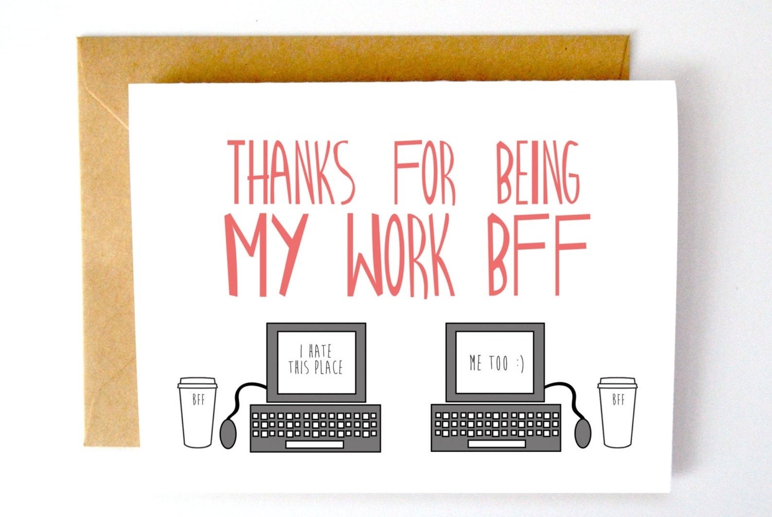 A white card with "Thanks for being my work BFF" in red type, with two drawings of computers—one says "I hate this place," the other says "Me too :)"