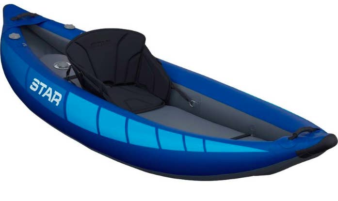 Inflatable kayak with attached seat in center 