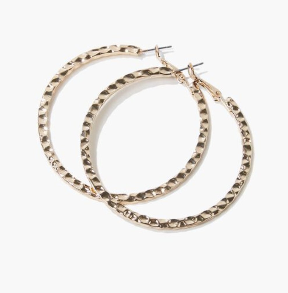 The gold hoop earrings