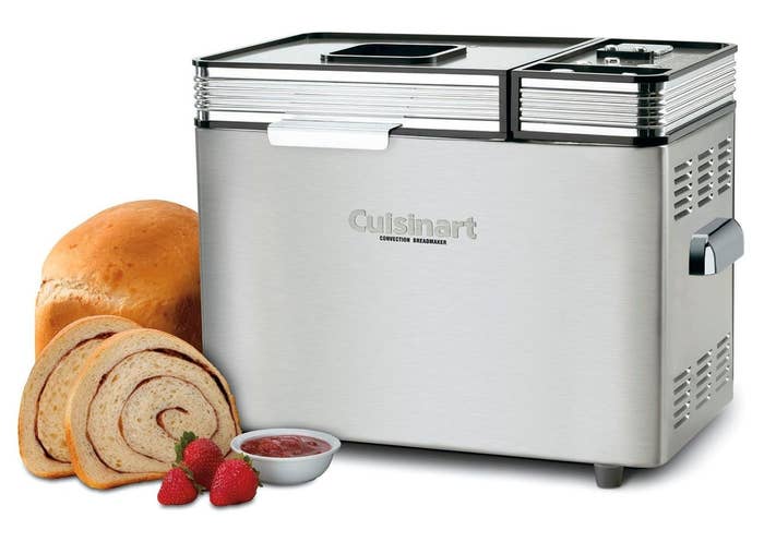 cuisinart bread maker with a swirl loaf sitting next to it