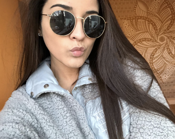 reviewer wearing the sunglasses