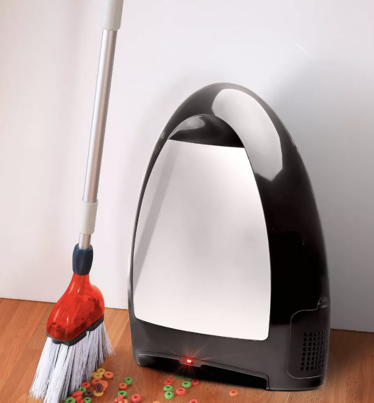 The black touchless vacuum about to suck up Froot Loops