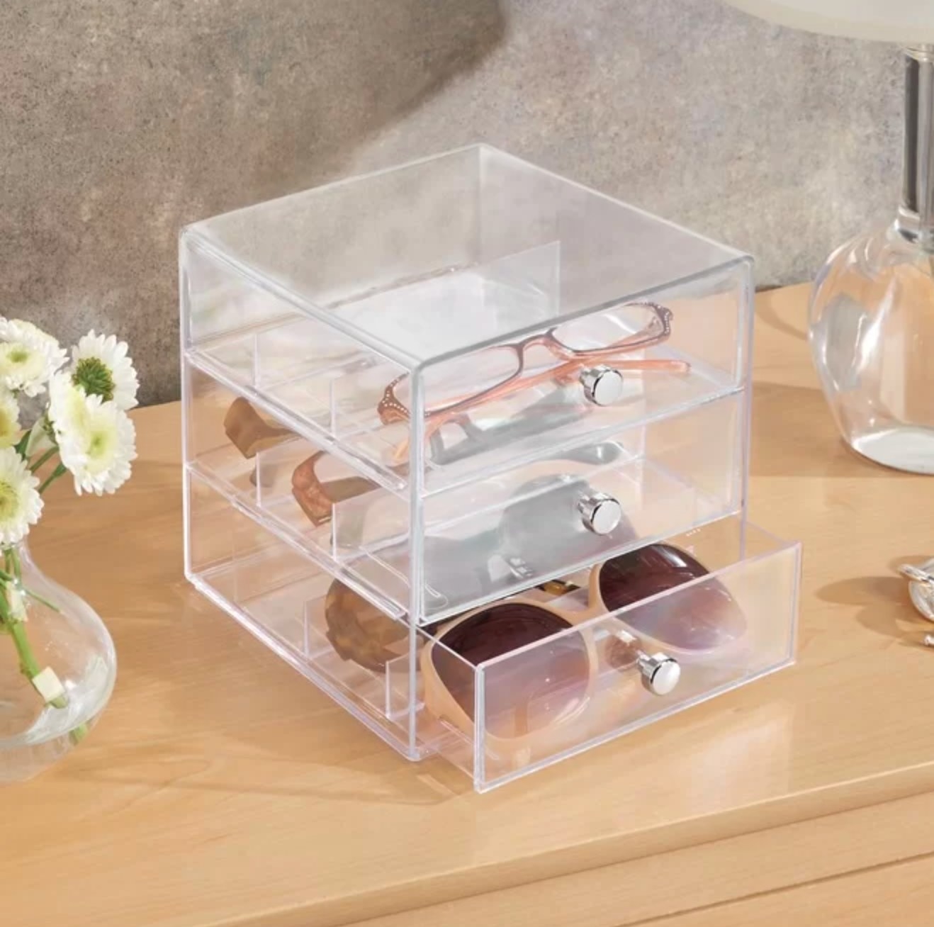 The sunglass organizer in clear plastic