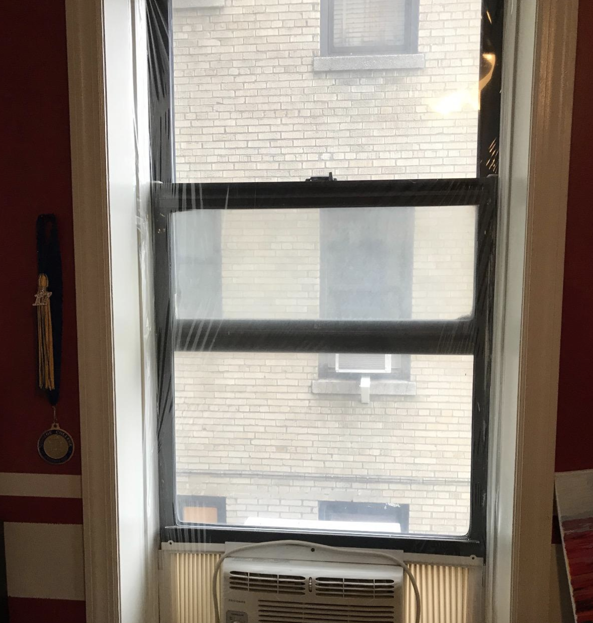 reviewer photo of insulated window and air conditioner 