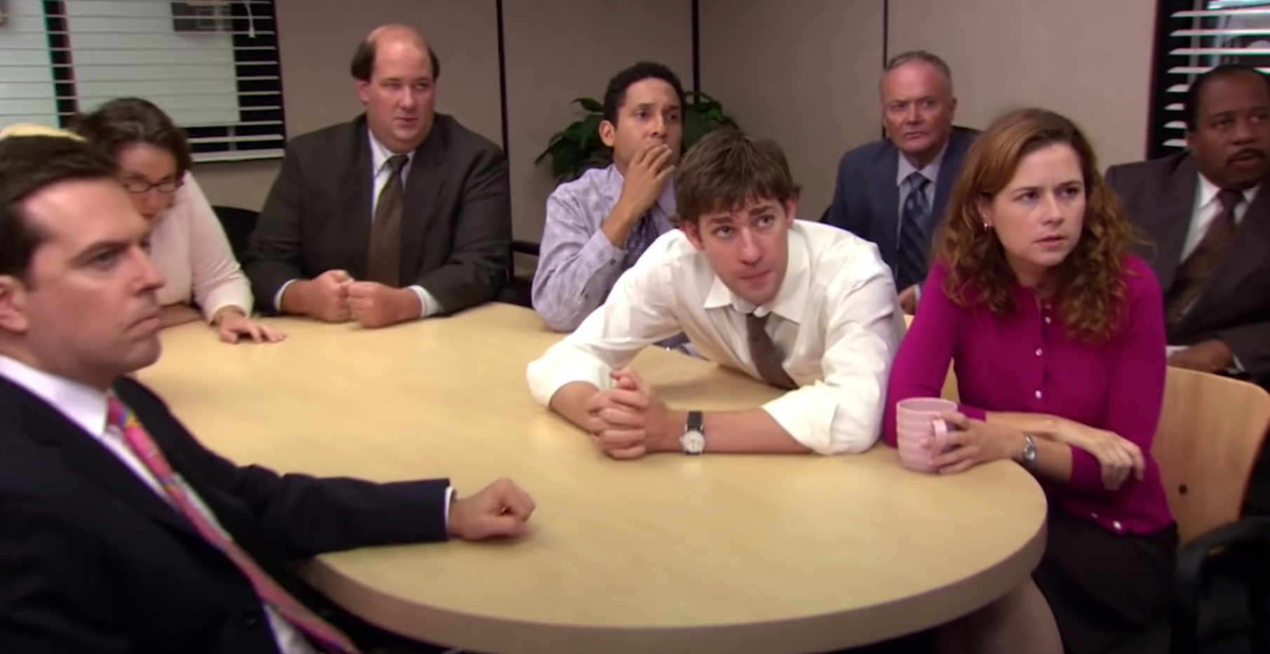 Members of &quot;The Office&quot; sit in their conference room 