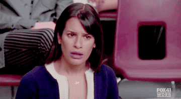 Rachel berry in glee looking confused and flabbergasted 