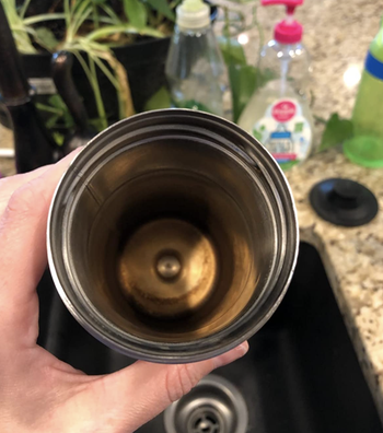 The insider of a reviewer's water bottle looking rusty and dirty