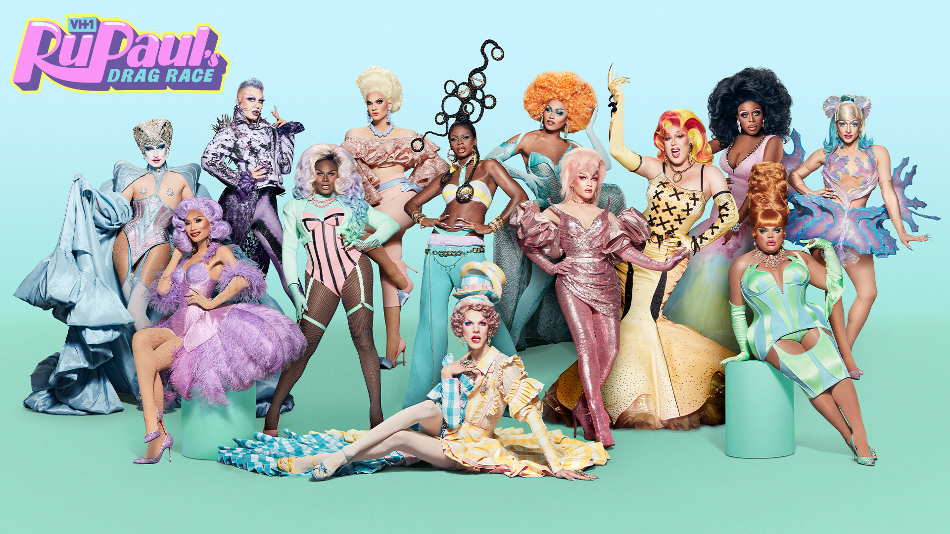 Promotional photo of the entire cast dressed in pastel colors with a teal background