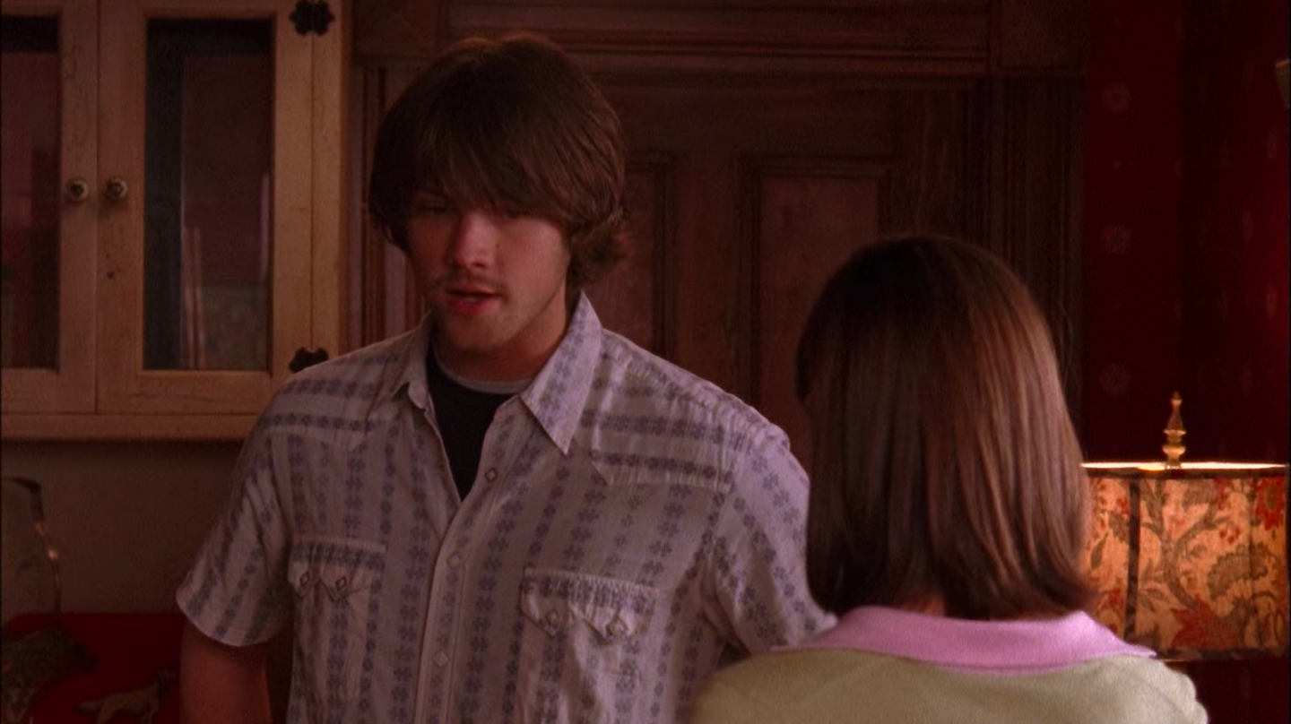 Dean with shaggy hair and weird facial hair