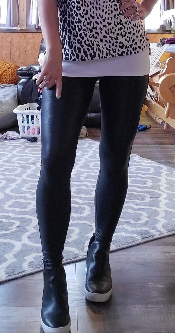 Reviewer showing leggings close up