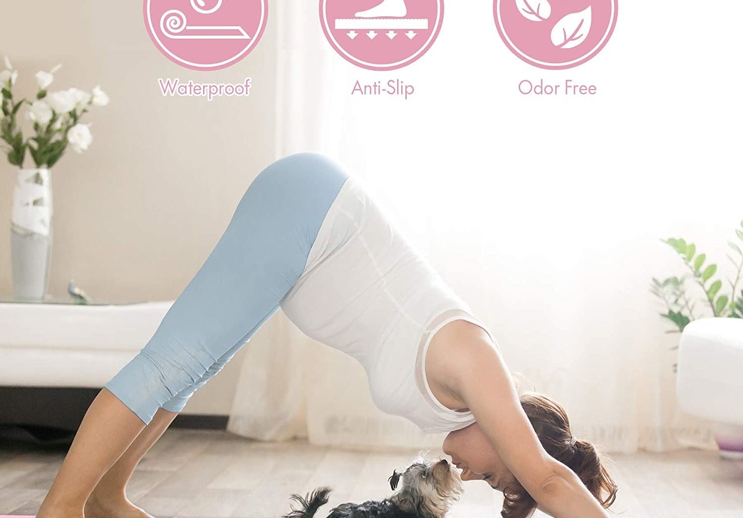 A person doing downward dog with their dog